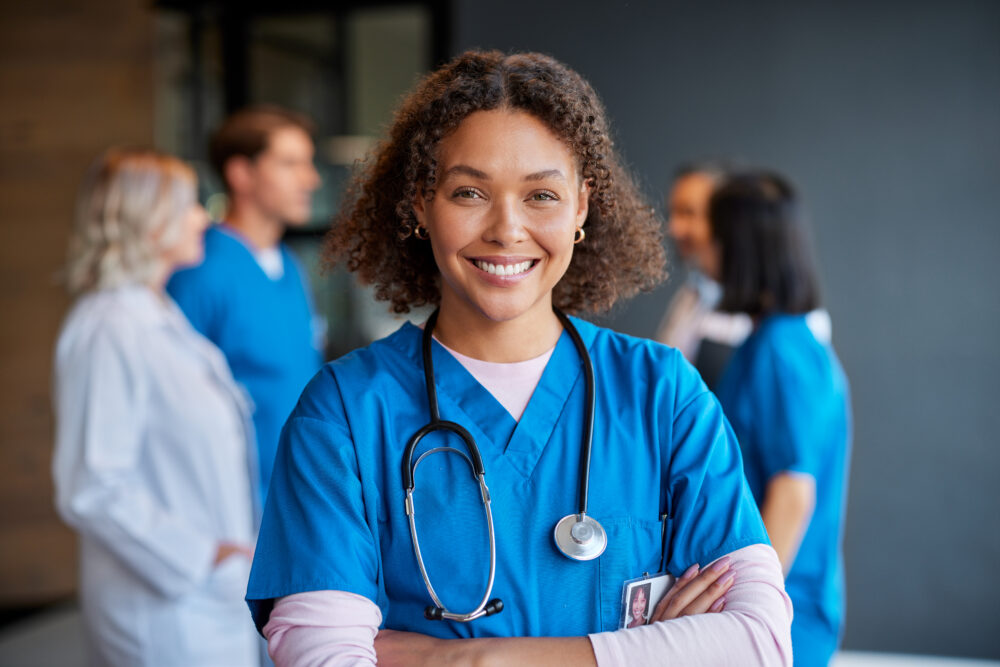 Portrait of smiling african woman nurse